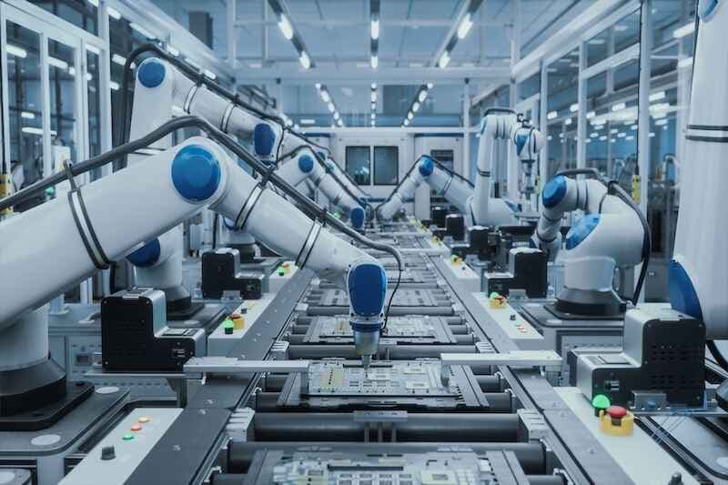 Advanced Microelectronics Manufacturing: AI Robotic Arms Assembling Circuit Boards on a Modern Production Line.