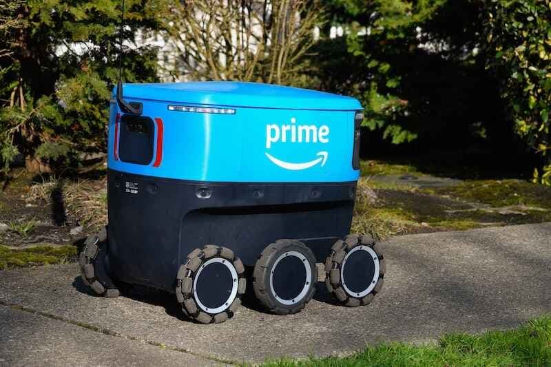 Amazon Prime Scout autonomous electric delivery vehicle on a sidewalk