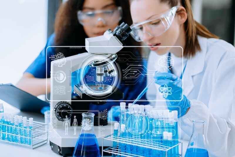 Scientist team meeting and writing analysis results in the laboratory study and analyze scientific sample