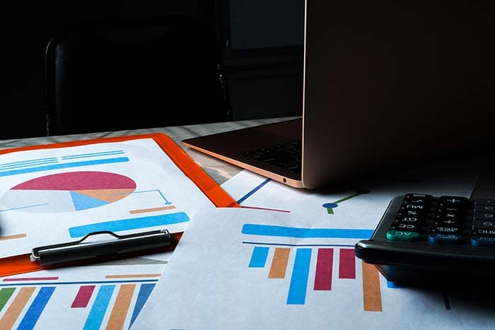 Charts spread out on a desk